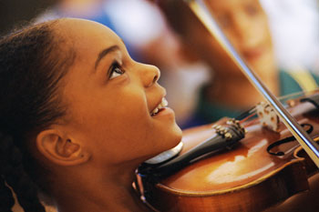 Happy Child Playing the Violin