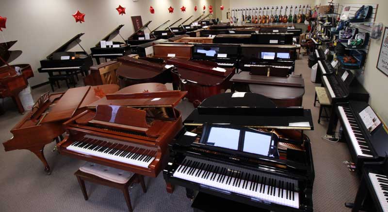 overshot of music store featuring new and used pianos for purchase