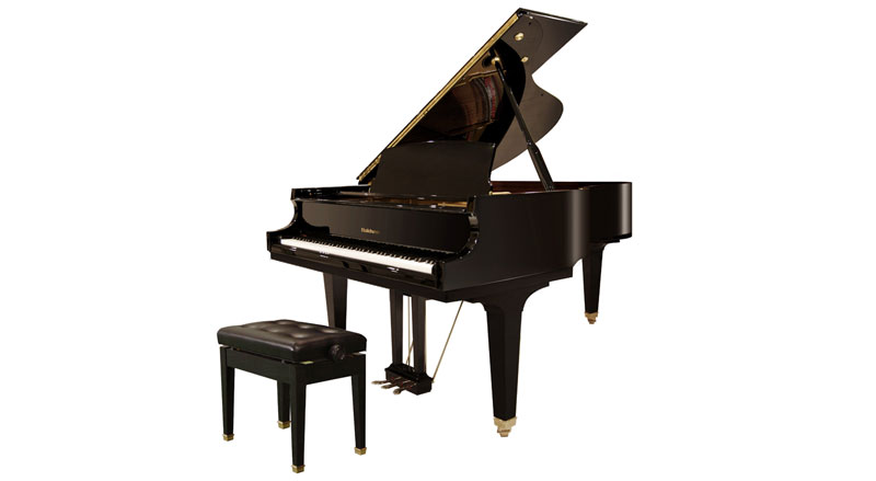 Sleek black Baldwin grand piano with matching bench